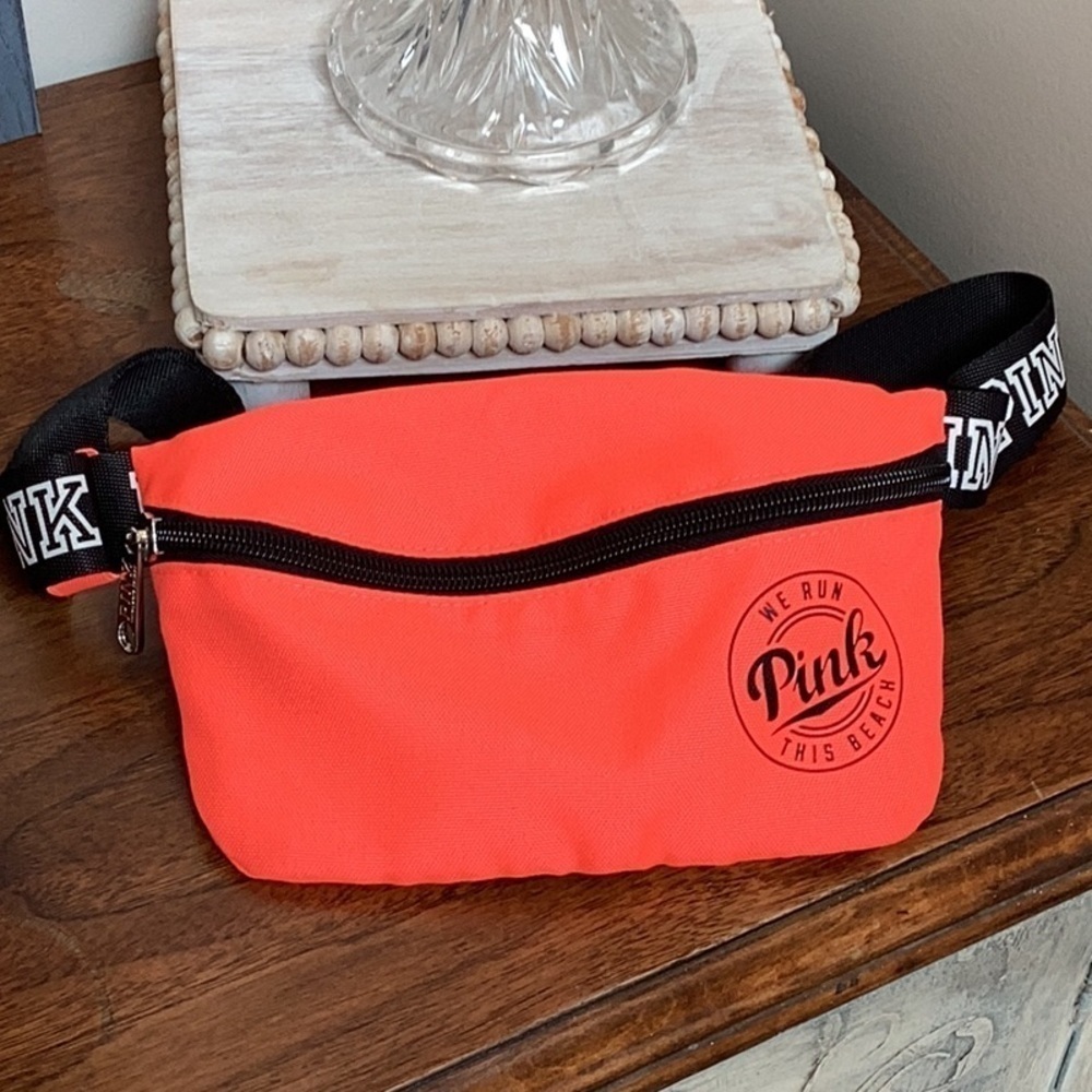 Pink Victoria’s Secret neon coral color belt bag “We run this beach”